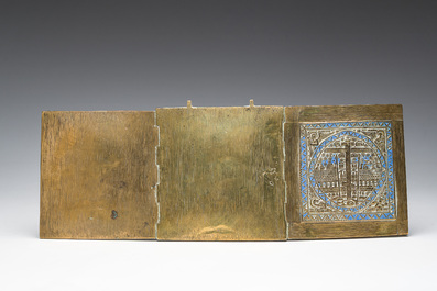 Two Russian orthodox partly enamelled bronze travel icons and an icon cross, 19th/20th C.