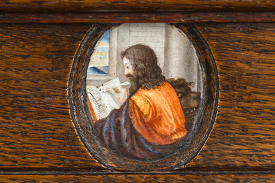 A French richly carved oak Neo-Renaissance credence with portrait miniatures, 19th C.