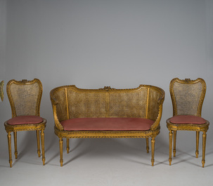 A French Louis XVI style eight-piece carved and gilt wooden salon set, 19th/20th C.