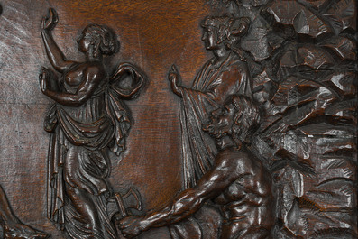 A French richly carved oak Neo-Renaissance credence with portrait miniatures, 19th C.