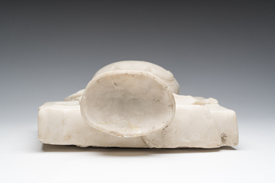 A French white marble sculpture of a chalice resting on a book, 18th/19th C.