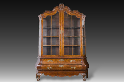 A large Louis XV style burl wood veneered wooden display cabinet with two glass doors and two drawers, ca. 1900