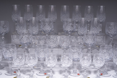 A French 48-piece collection of colourless crystal glasses with etched design, Bayel, 20th C.