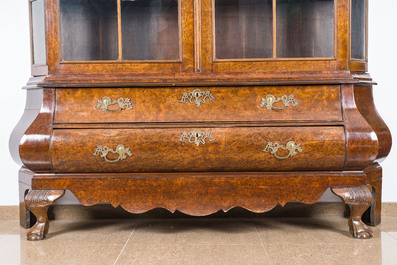A large Louis XV style burl wood veneered wooden display cabinet with two glass doors and two drawers, ca. 1900