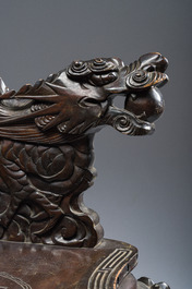 A pair of Japanese carved wooden 'dragon' chairs, Meiji, 19th/20th C.