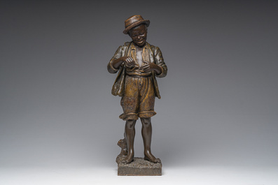 Cherc for Goldscheider (Hans Sch&ouml;rk (1849-1899), after): A polychrome decorated terracotta figure of a youth, Goldscheider mark, 20th C.