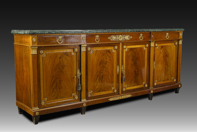 An imposing French Empire style gilt bronze mounted cherrywood dresser with a green marble top, 20th C.