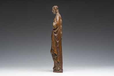 A Flemish carved, polychrome decorated and gilt oak sculpture of a female saint or 'Poup&eacute;e de Malines', 16th C.