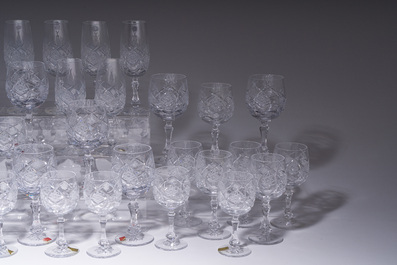 A French 48-piece collection of colourless crystal glasses with etched design, Bayel, 20th C.