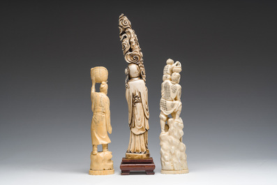 A Chinese carved ivory 'Shou Lao' figure and two walrus ivory groups depicting the local population, 19th/20th C.