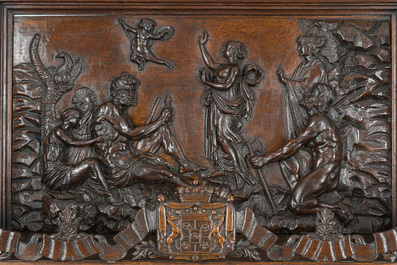 A French richly carved oak Neo-Renaissance credence with portrait miniatures, 19th C.