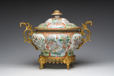 A Chinese Canton famille rose gilt mounted tureen and cover with animated scenes resting on four elephant heads, 19th C.