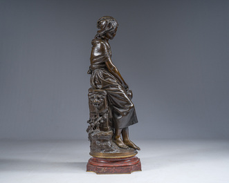 Mathurin Moreau (1822-1912): Girl sitting on a rock with a jug in her hand, brown patinated bronze on a red marble base