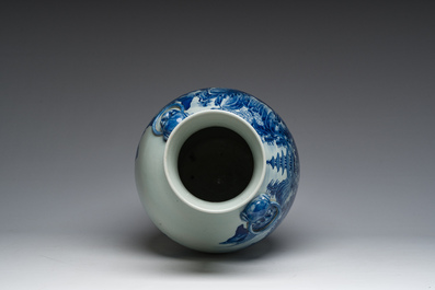 A Chinese blue and white baluster vase with an animated river landscape, 19th C.