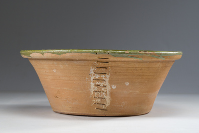 A French Proven&ccedil;al green-glazed 'tian' bowl, late 19th C.