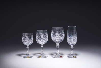 A French 48-piece collection of colourless crystal glasses with etched design, Bayel, 20th C.