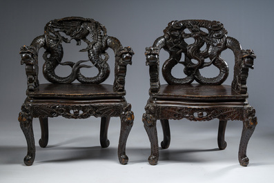 A pair of Japanese carved wooden 'dragon' chairs, Meiji, 19th/20th C.
