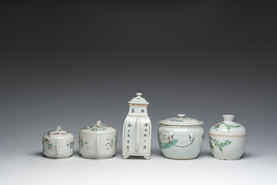 Three Chinese famille rose and qianjiang cai teapots and two bowls and covers with animated scenes and floral design, 19th/20th C.