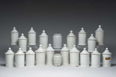 Two Dutch Delft blue and white and eighteen gilt and polychrome decorated porcelain pharmacy jars, 18th/19th C.
