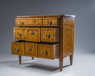 A French Louis XVI style bronze mounted parquetry veneered wooden chest of drawers, 19th C.