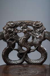 A pair of Japanese carved wooden 'dragon' chairs, Meiji, 19th/20th C.