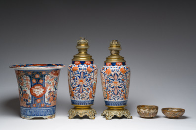 Two Japanese Satsuma bowls with animated scenes, an Imari jardini&egrave;re with floral design and two vases mounted into lamps, Meiji, 19th/20th C.