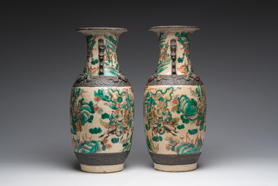 A pair of Chinese Nanking crackle glazed famille verte 'warrior' vases, 19th C.