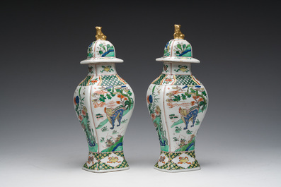 A pair of French Samson famille verte style 'mythical animals' vases and covers, Paris, 19th C.
