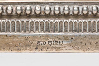 A pair of English silver Corinthian column-shaped candlesticks, maker's mark James Dixon &amp; Sons, Sheffield, dated 1906
