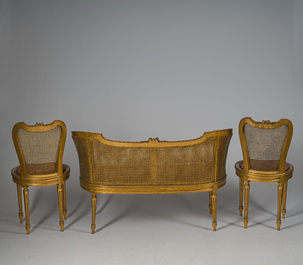 A French Louis XVI style eight-piece carved and gilt wooden salon set, 19th/20th C.
