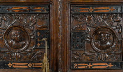 A French richly carved oak Neo-Renaissance credence with portrait miniatures, 19th C.