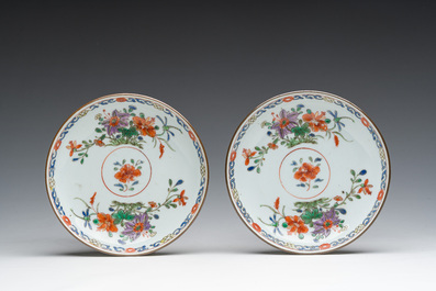 Two Chinese famille verte cups and saucers with floral design, Qianlong