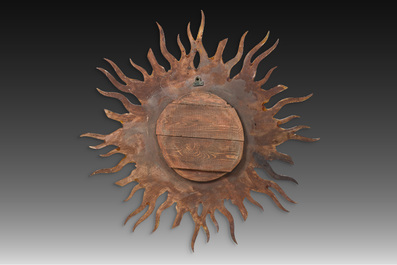A large gilt and carved wooden sun mirror, 20th C.