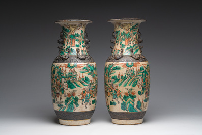 A pair of Chinese Nanking crackle glazed famille verte 'warrior' vases, 19th C.