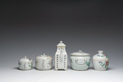 Three Chinese famille rose and qianjiang cai teapots and two bowls and covers with animated scenes and floral design, 19th/20th C.