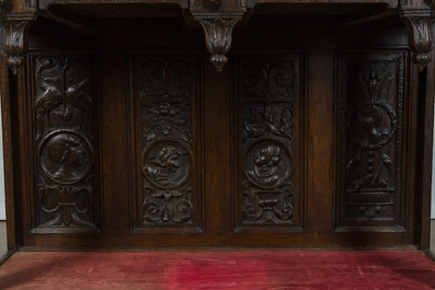 A French richly carved oak Neo-Renaissance credence with portrait miniatures, 19th C.