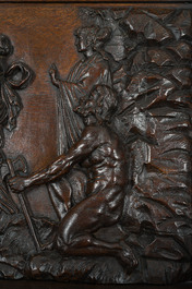 A French richly carved oak Neo-Renaissance credence with portrait miniatures, 19th C.