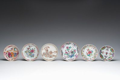 Six Chinese famille rose and gilt cups and saucers and a cream jug with floral and mandarin design, Yongzheng/Qianlong
