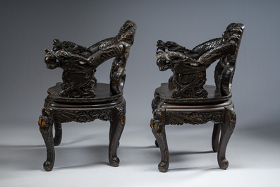 A pair of Japanese carved wooden 'dragon' chairs, Meiji, 19th/20th C.
