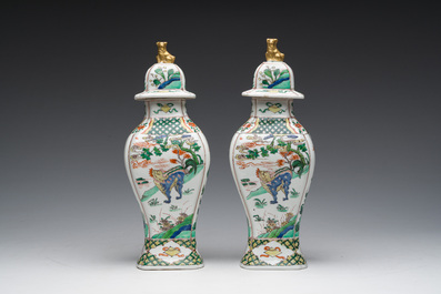 A pair of French Samson famille verte style 'mythical animals' vases and covers, Paris, 19th C.