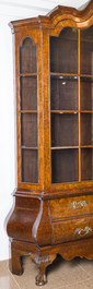 A large Louis XV style burl wood veneered wooden display cabinet with two glass doors and two drawers, ca. 1900