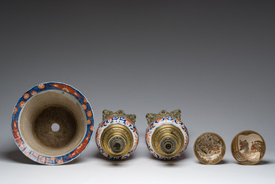 Two Japanese Satsuma bowls with animated scenes, an Imari jardini&egrave;re with floral design and two vases mounted into lamps, Meiji, 19th/20th C.