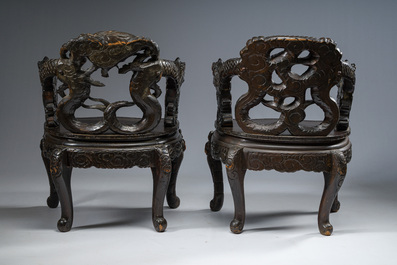 A pair of Japanese carved wooden 'dragon' chairs, Meiji, 19th/20th C.