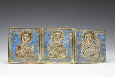 Two Russian orthodox partly enamelled bronze travel icons and an icon cross, 19th/20th C.