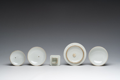 Three Chinese famille rose and qianjiang cai teapots and two bowls and covers with animated scenes and floral design, 19th/20th C.