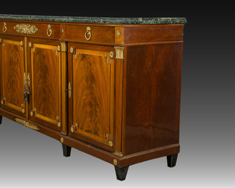 An imposing French Empire style gilt bronze mounted cherrywood dresser with a green marble top, 20th C.