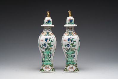 A pair of French Samson famille verte style 'mythical animals' vases and covers, Paris, 19th C.