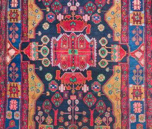 Four oriental rugs, a.o. Tabriz, Sarouk and Hamadan/Nahavand rugs with floral and geometric design, wool and cotton, 20th C.