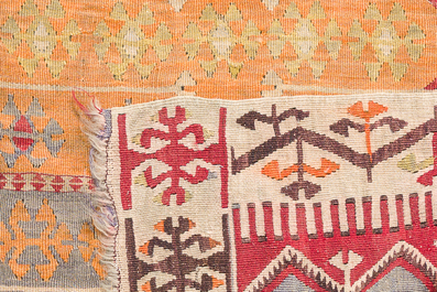 Four oriental rugs, a.o. a Turkish Kelim (Kilim) rug with geometric design, wool and cotton, 20th C.