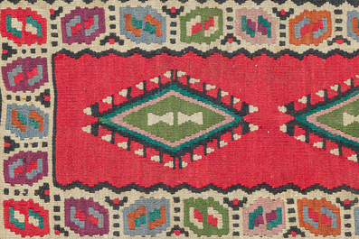 Four oriental carpets, a.o. three Turkish Kelim (Kilim) rugs with geometric design, wool on cotton, 20th C.